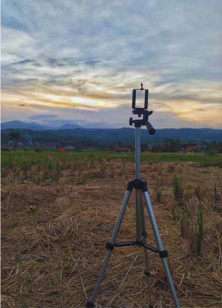 Tripod stand with mountains in the background